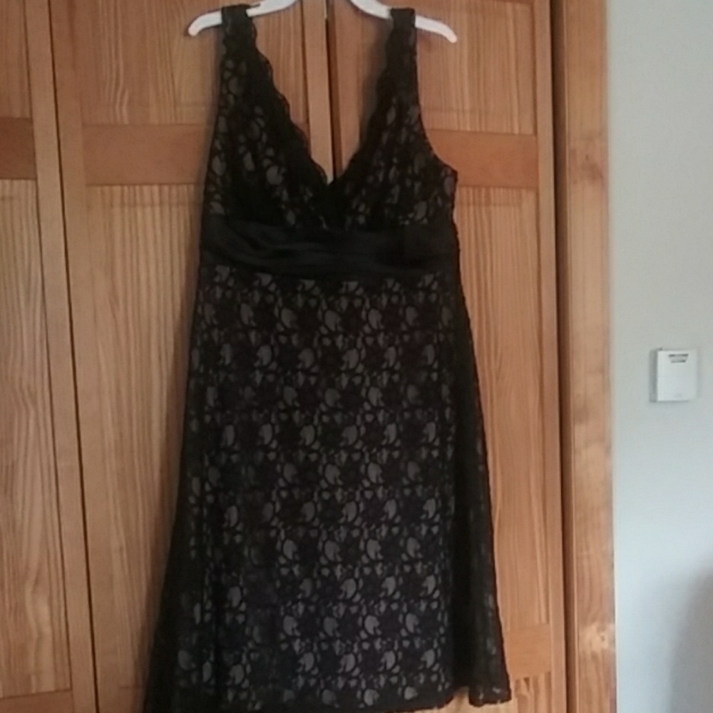 Black lace dress with a tan under